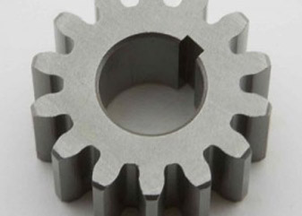 Feed drive oil pump gear
